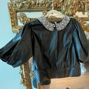 Anthropologie faux leather top with pearl collar